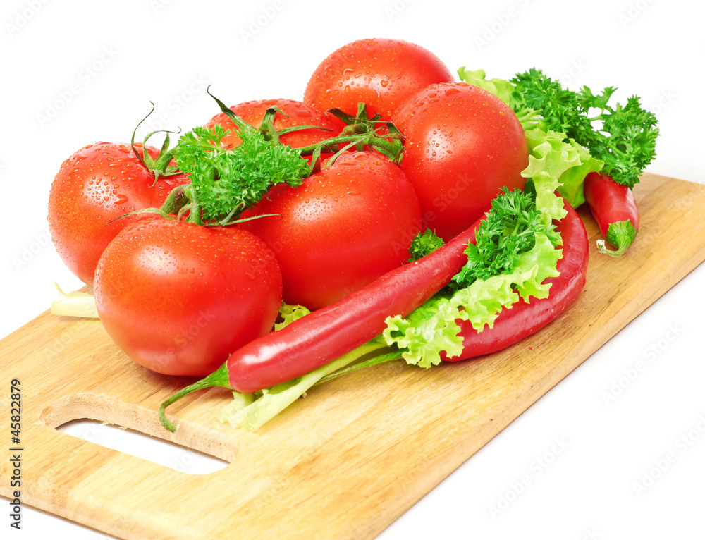 Composition with raw vegetables on kitchen table Composition with raw vegetables on kitchen table