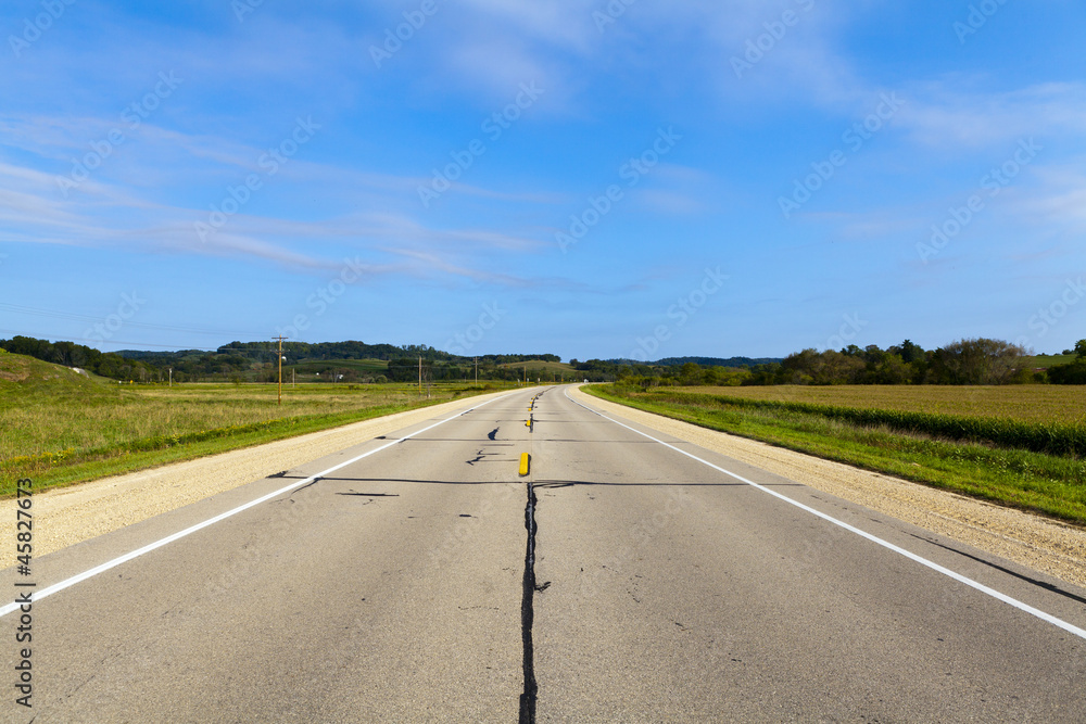 Fototapeta premium Countryside Road With Blue Sky