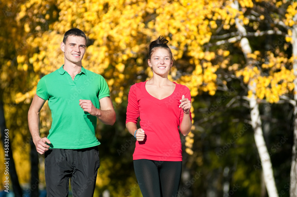 Young man and woman running Young man and woman running