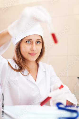 nurse with test tube