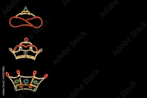 Valokuvatapetti Three Kings Crowns against black © Arena Photo UK