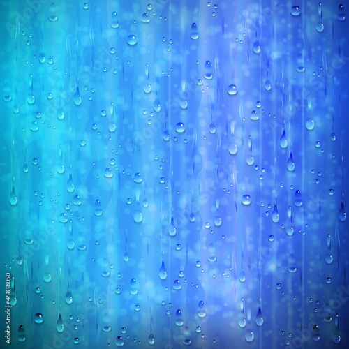 Blue rainy window background with drops and blur