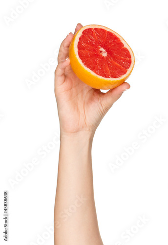 Hand with grapefruit