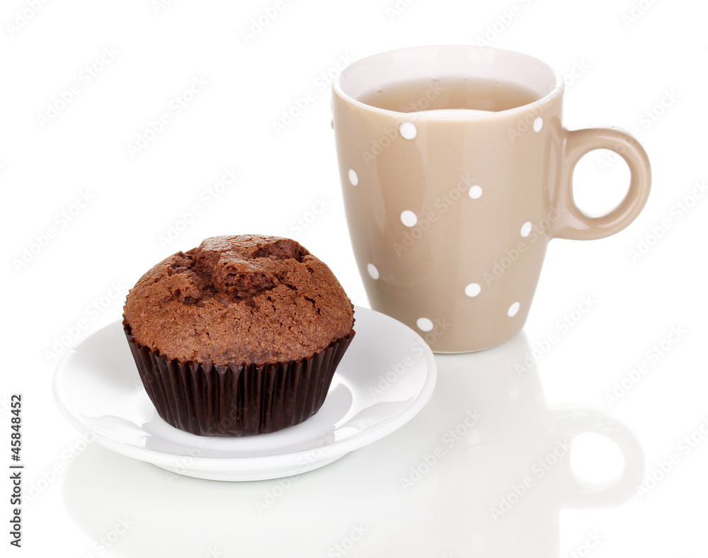 Fresh muffin with tea isolated on white Fresh muffin with tea isolated on white