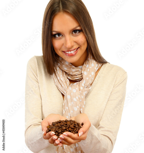 beautiful young woman with coffee beans  isolated on white