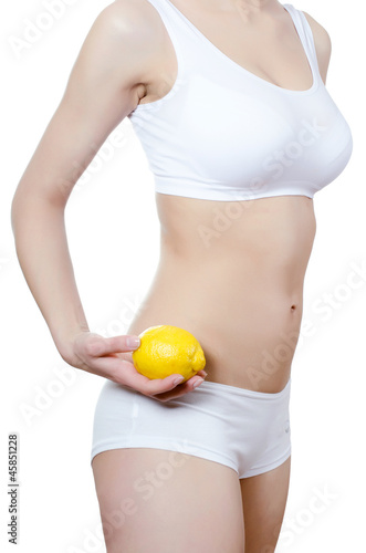 The beautiful girl with an Lemon in a hand