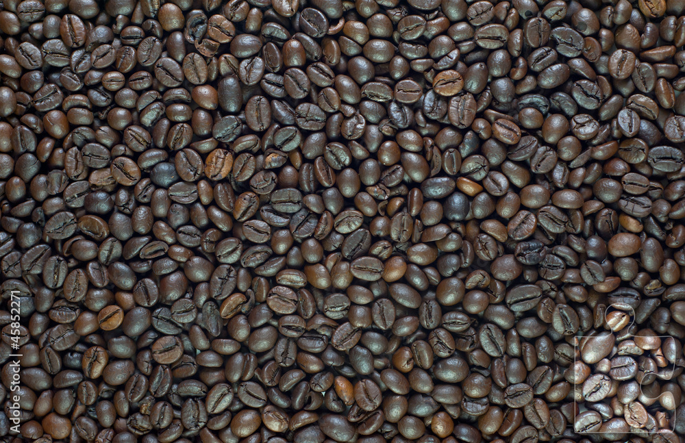 Jigsaw icon on coffee texture and background Jigsaw icon on coffee texture and background