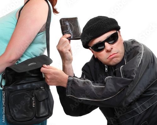 Canvastavla Thief stealing from handbag of a woman.