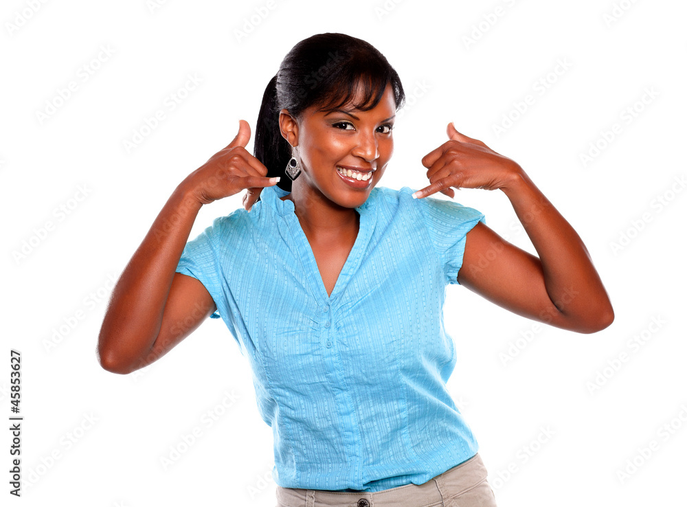 Pretty young woman looking at you saying call me