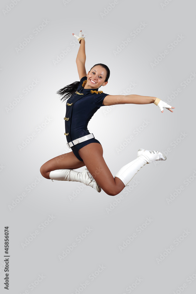 Young female dancer against white background Young female dancer against white background