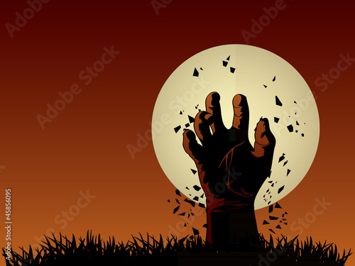 Zombie hand coming out from grave