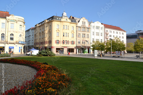 Historic buildings on the square with lawn