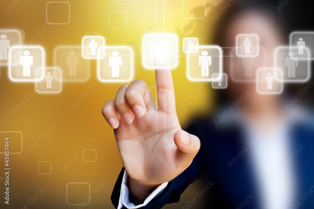 hand of business women pushing a button on a touch screen interf hand of business women pushing a button on a touch screen interf