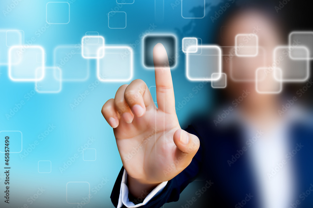 hand of business women pushing a button on a touch screen interf hand of business women pushing a button on a touch screen interf