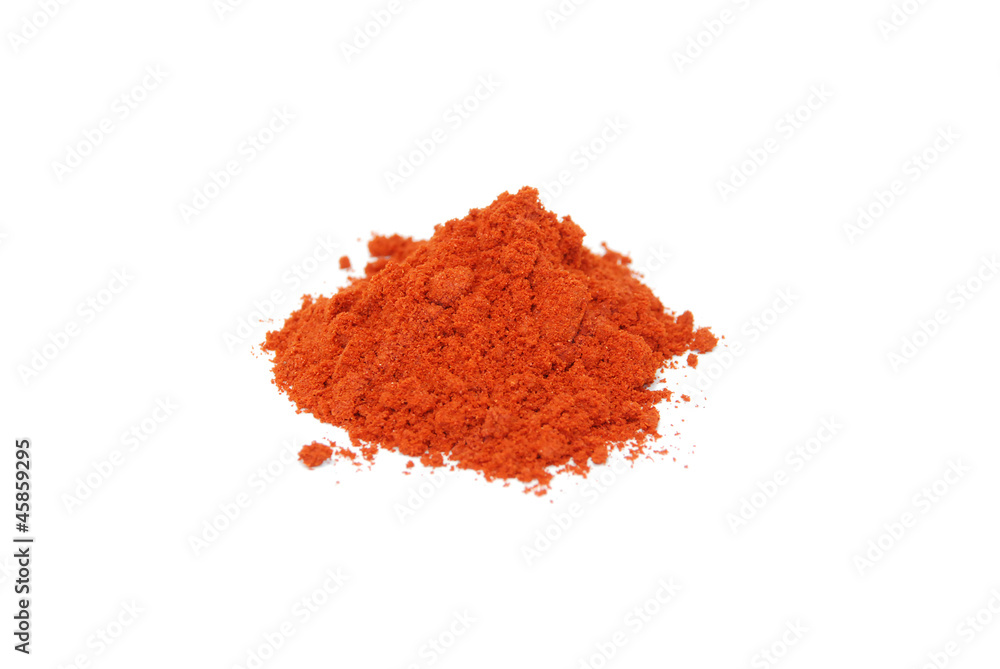 Paprika powder, isolated on a white background Paprika powder, isolated on a white background