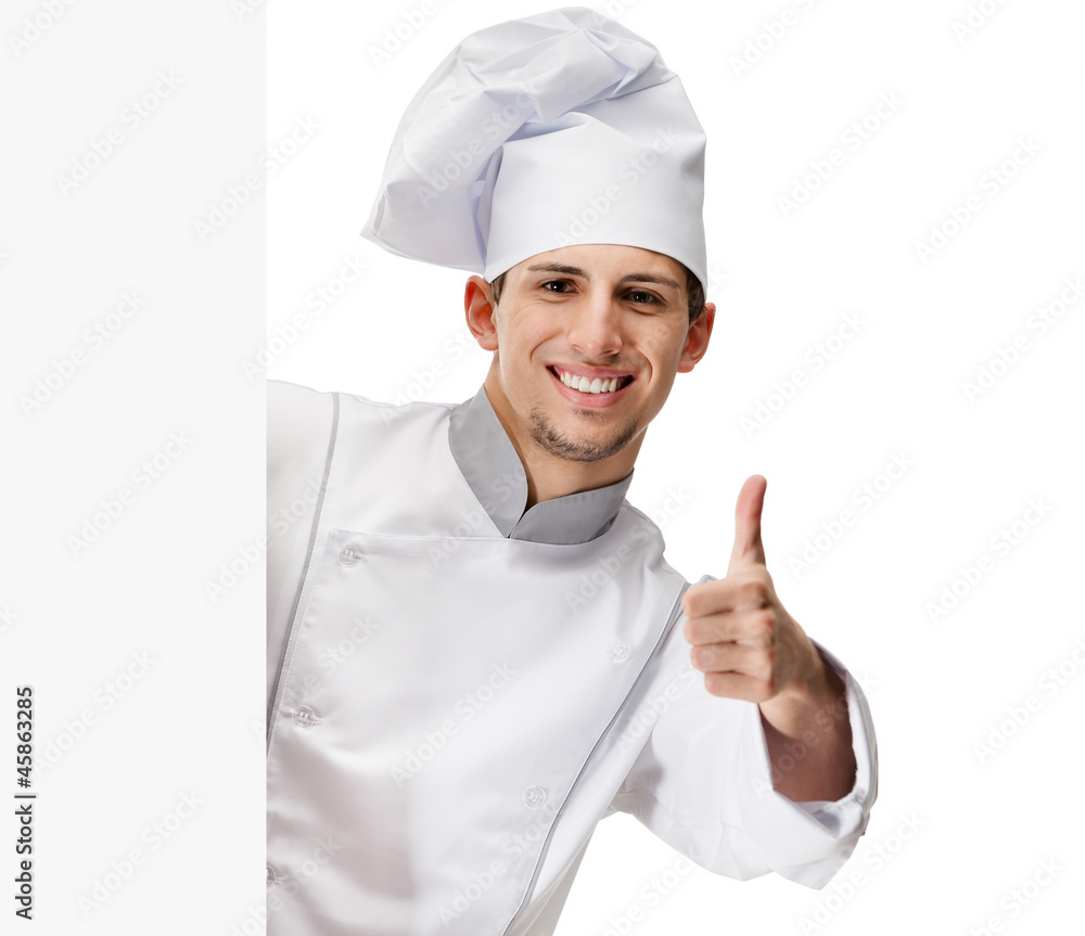 Looking out of cardboard sheet chef cook thumbs up Looking out of cardboard sheet chef cook thumbs up