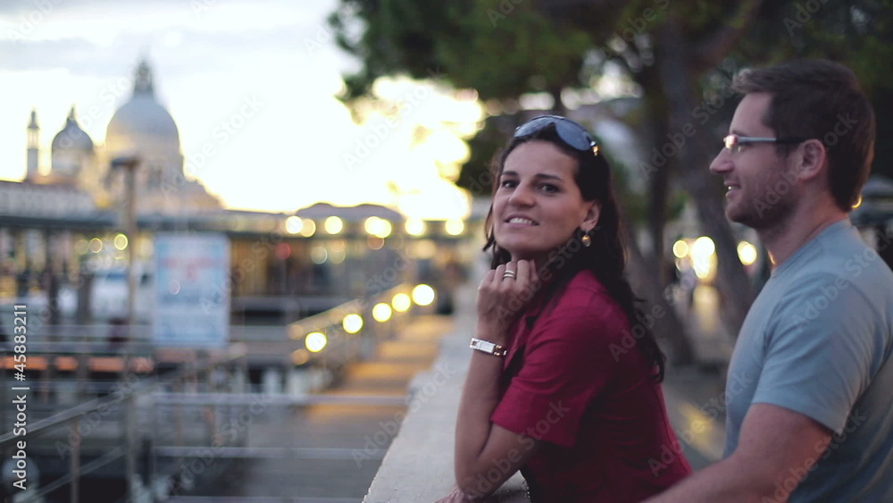 Couple in love hugging and kissing in Venice, evening, steadycam Couple in love hugging and kissing in Venice, evening, steadycam