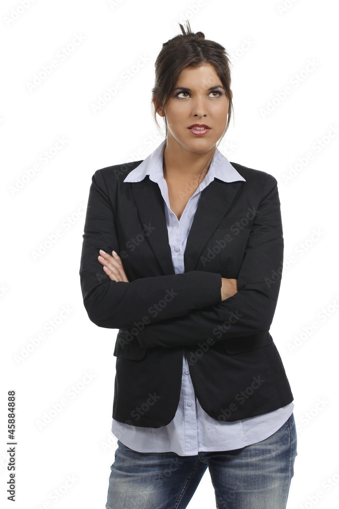 Junge Frau im Bürooutfit schaut skeptisch Junge Frau im Bürooutfit schaut skeptisch
