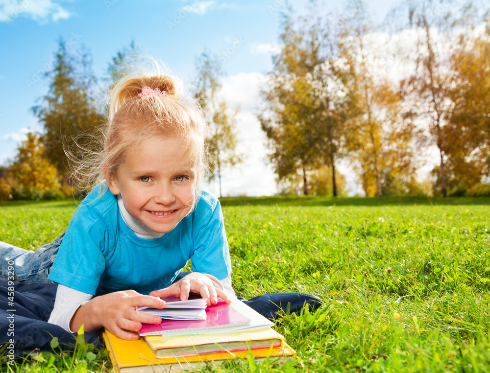 Cute smiling blonde girl in park Cute smiling blonde girl in park