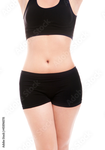 Slim woman's body isolated over white background