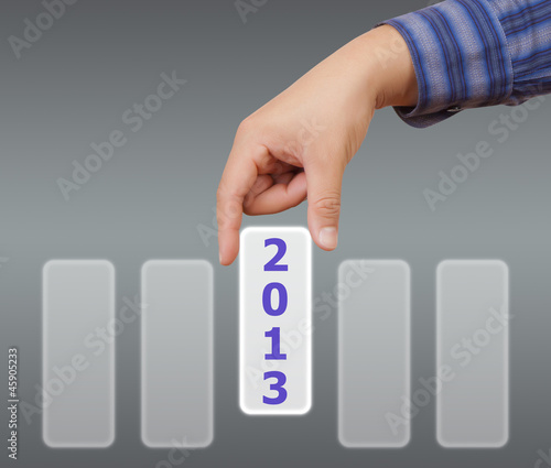 man hand touching button 2013 keyword
