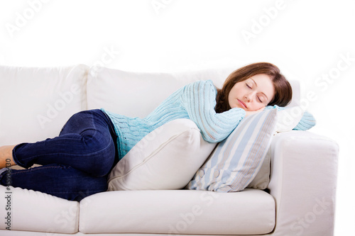 Beautiful Young Woman Sleeping On The Couch