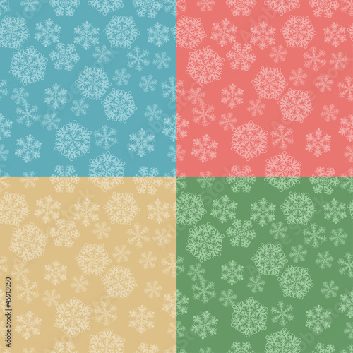 Set of 4 Christmas seamless pattern with snowflakes.