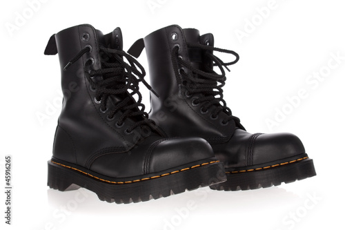 Obraz na plátne Military style black boots isolated on white background