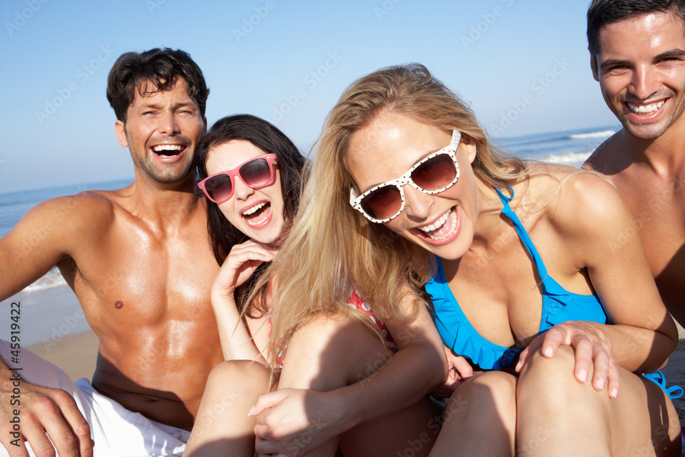 Group Of Friends Enjoying Beach Holiday Group Of Friends Enjoying Beach Holiday