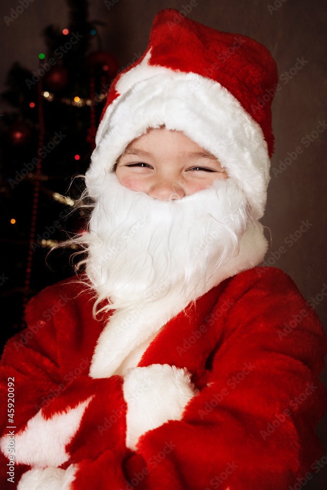 Happy small boy in santa hat Happy small boy in santa hat