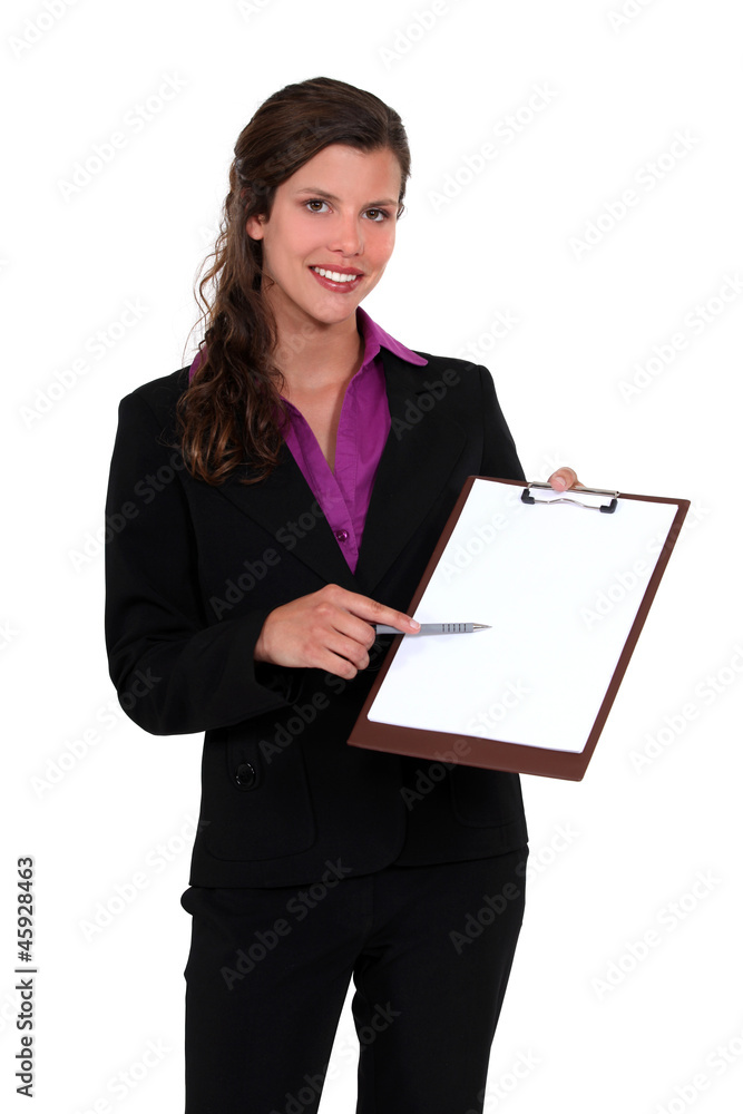 Businesswoman with a blank clipboard Businesswoman with a blank clipboard