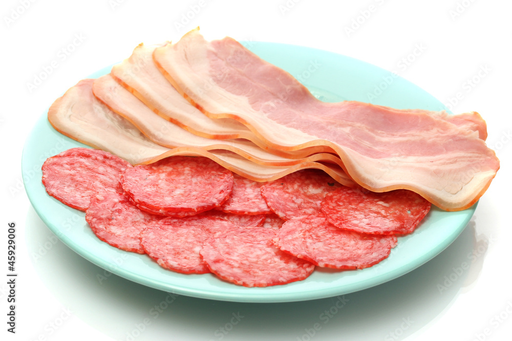 tasty bacon and sausage on plate, isolated on white tasty bacon and sausage on plate, isolated on white