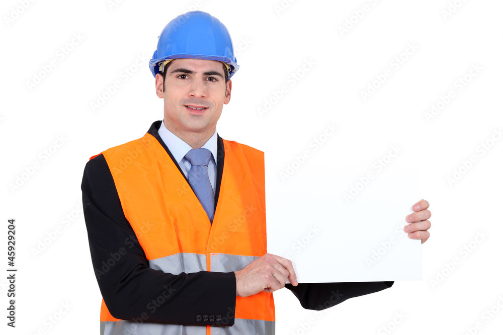 young architect holding board against white background young architect holding board against white background