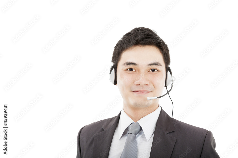 handsome businessman wearing headset and smiling isolated on whi handsome businessman wearing headset and smiling isolated on whi