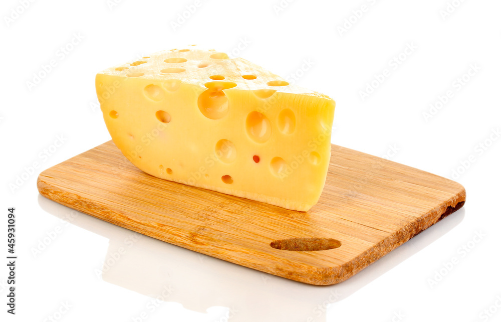tasty cheese on wooden board isolated on white