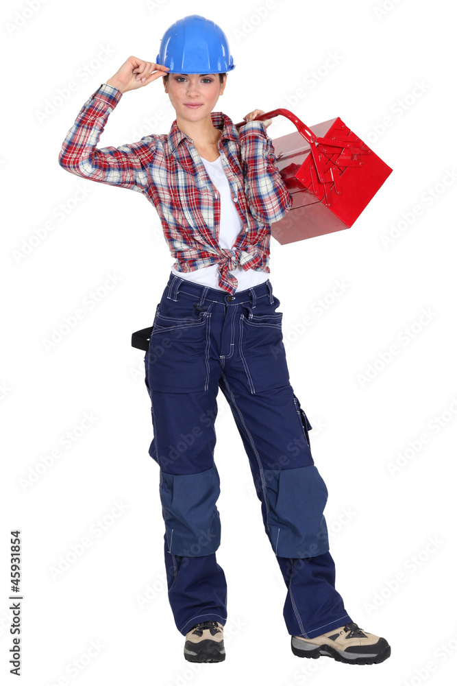 Female builder holding tool box Female builder holding tool box