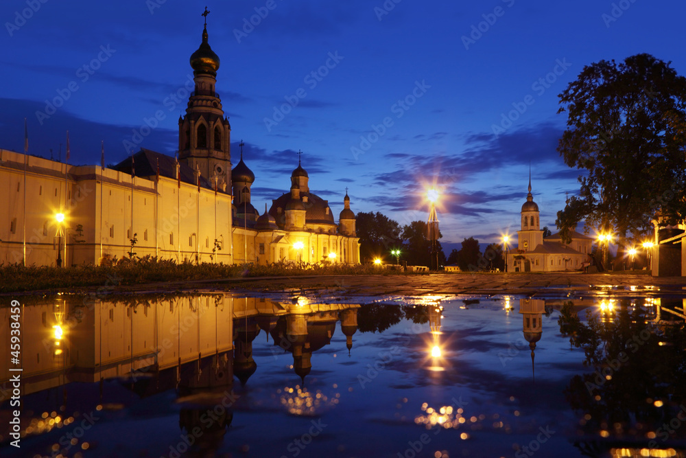 puddle on Kremlin square in night with Alexander Nevsky Church