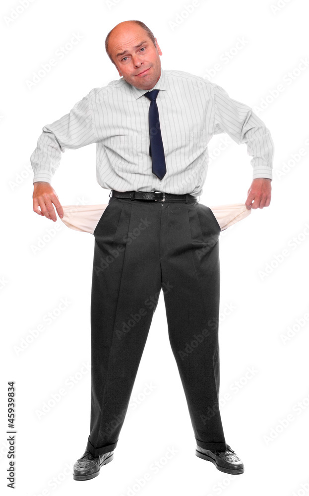 Businessman holding his two empty pockets. Businessman holding his two empty pockets.