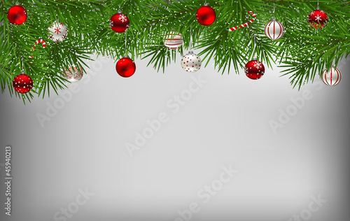 Fir branches  decorated with Christmas baubles