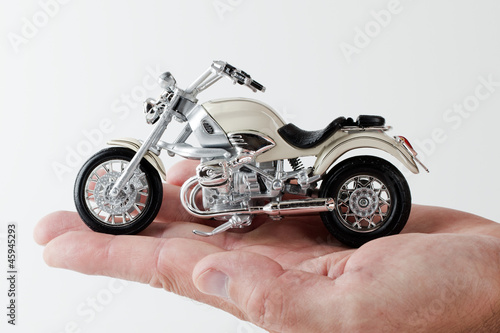 motorcycle on a palm