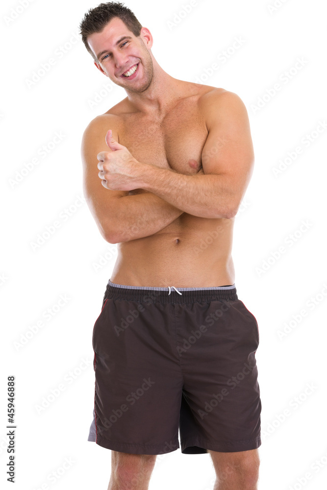 Fototapeta premium Happy male athlete showing thumbs up