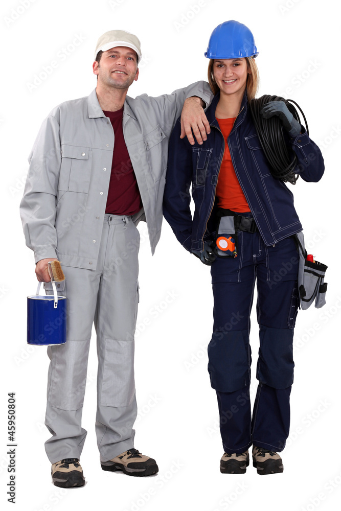 Painter and electrician standing side by side Painter and electrician standing side by side