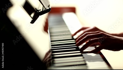 Close-up of pianist's hands playing