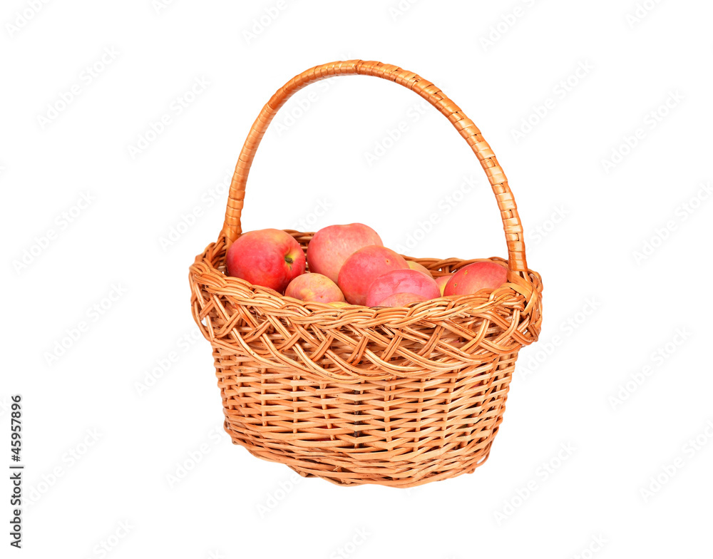 Red apple in a wattled basket, isolated on white background Red apple in a wattled basket, isolated on white background