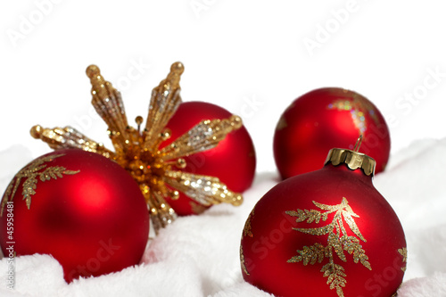 Red and Gold Christmas Decorations on white
