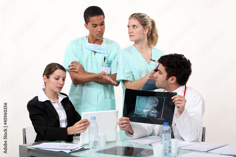 Fototapeta premium Hospital staff hard at work