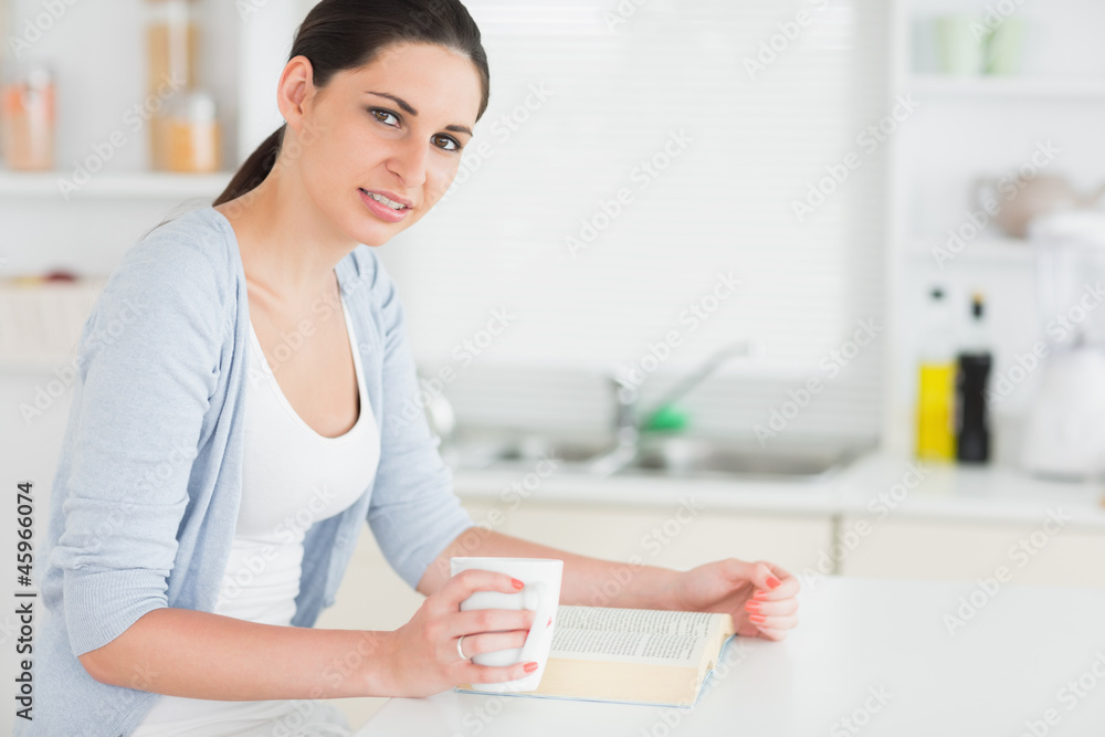 Brunette reading a book Brunette reading a book