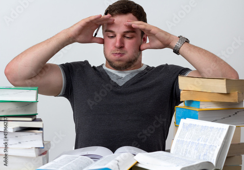 Young Student overwhelmed with studying
