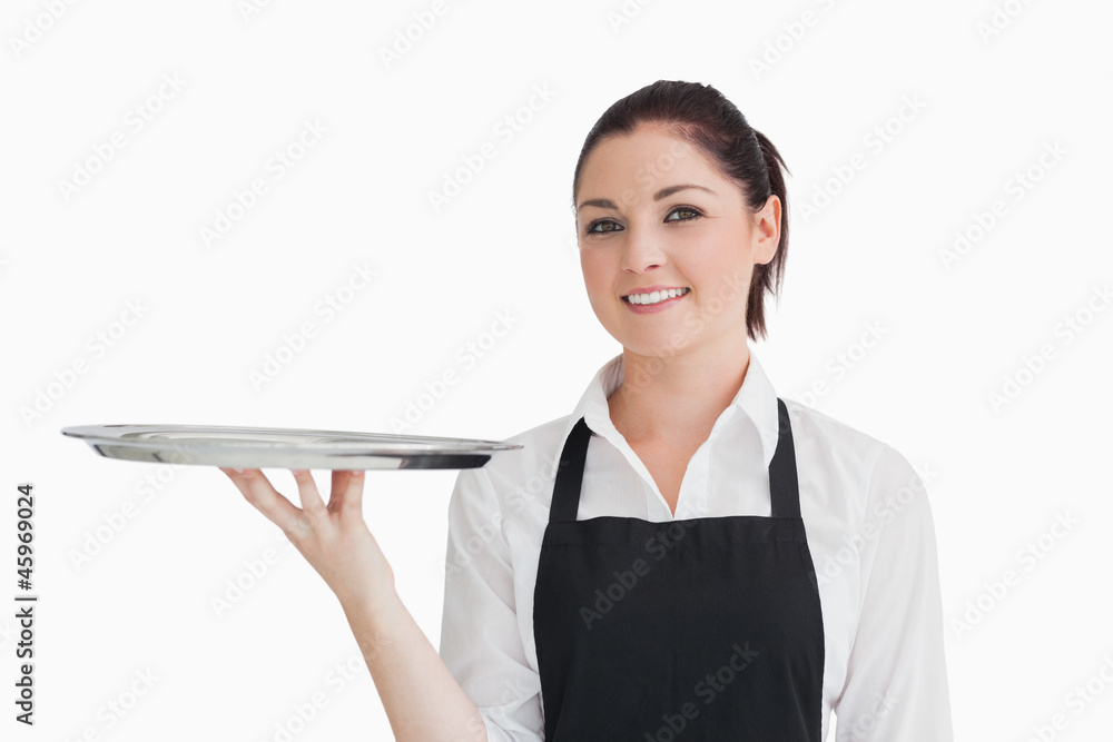 Waitress holding empty tray