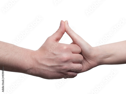 Man and woman forms her hand like a house - isolated photo